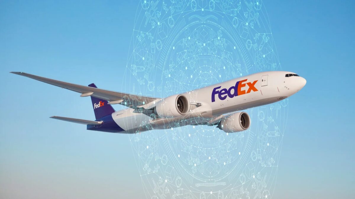 Máy bay chở hàng FedEx bay trên bầu trời cùng đồ họa mạng lưới kết nối số toàn cầu